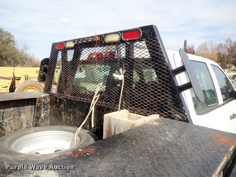 image for item DB7580 2015 Chevrolet Silverado 3500HD Crew Cab flatbed pickup truck