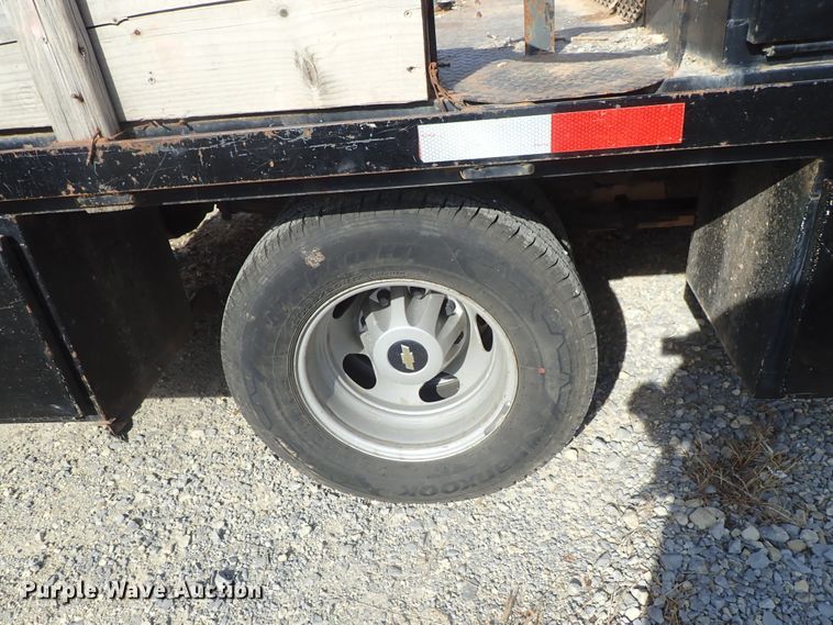 image for item DB7580 2015 Chevrolet Silverado 3500HD Crew Cab flatbed pickup truck