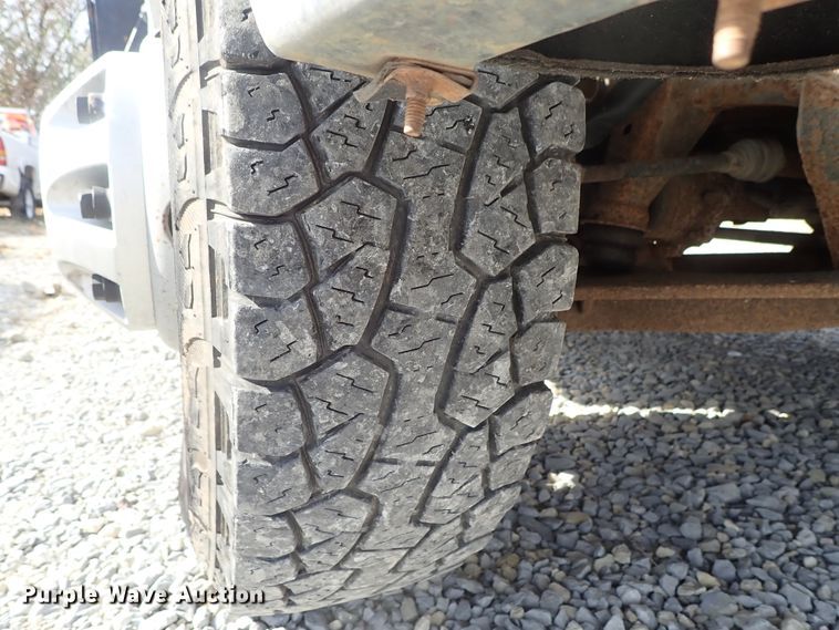 image for item DB7580 2015 Chevrolet Silverado 3500HD Crew Cab flatbed pickup truck