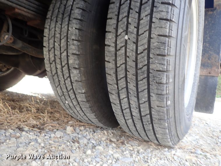 image for item DB7580 2015 Chevrolet Silverado 3500HD Crew Cab flatbed pickup truck