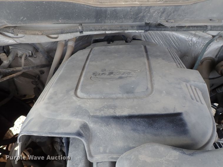 image for item DB7580 2015 Chevrolet Silverado 3500HD Crew Cab flatbed pickup truck