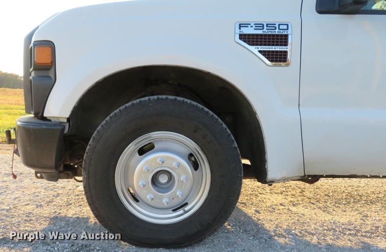 image for item DH1676 2008 Ford F350 Super Duty flatbed pickup truck
