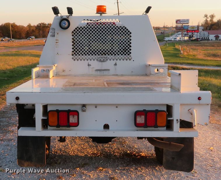 image for item DH1678 2014 Nissan Frontier Ext. Cab flatbed pickup truck