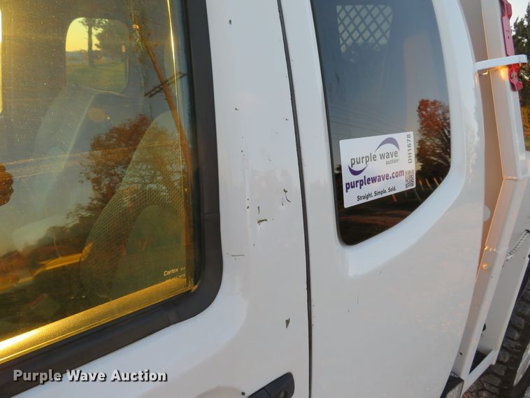 image for item DH1678 2014 Nissan Frontier Ext. Cab flatbed pickup truck