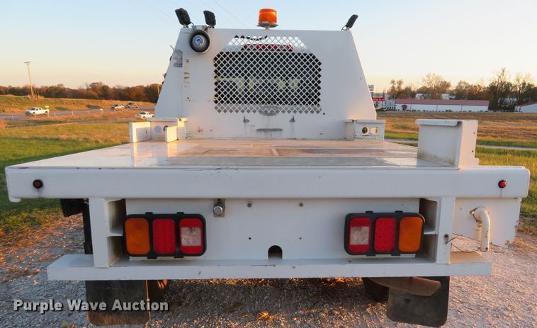 image for item DH1678 2014 Nissan Frontier Ext. Cab flatbed pickup truck