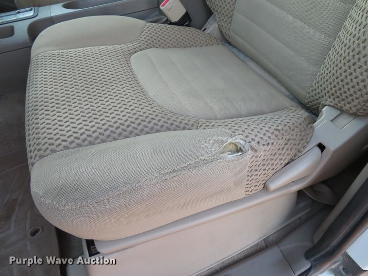 image for item DH1678 2014 Nissan Frontier Ext. Cab flatbed pickup truck