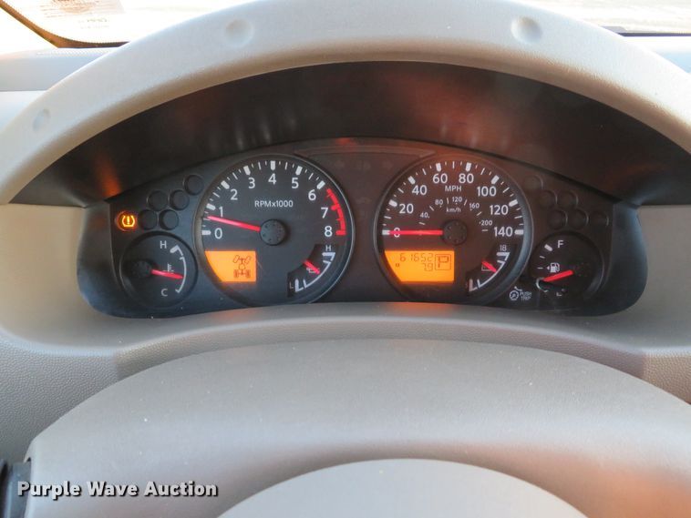 image for item DH1678 2014 Nissan Frontier Ext. Cab flatbed pickup truck