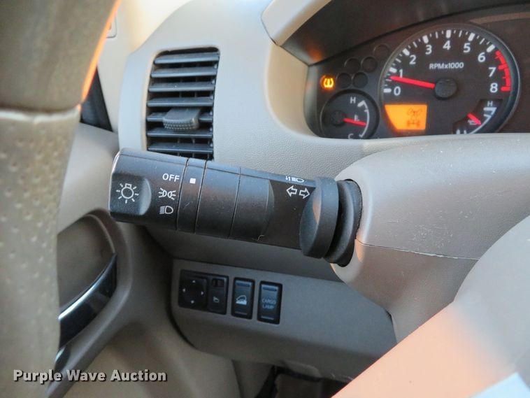 image for item DH1678 2014 Nissan Frontier Ext. Cab flatbed pickup truck