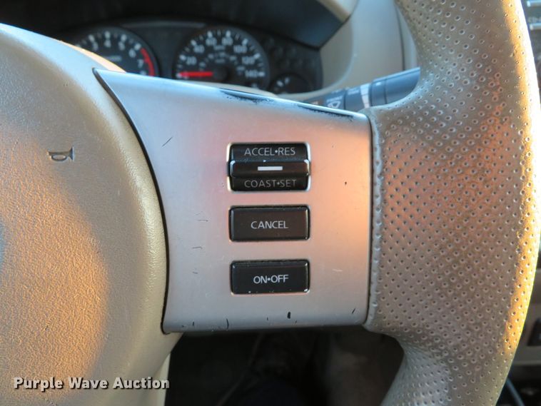 image for item DH1678 2014 Nissan Frontier Ext. Cab flatbed pickup truck