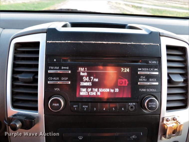 image for item DH1678 2014 Nissan Frontier Ext. Cab flatbed pickup truck