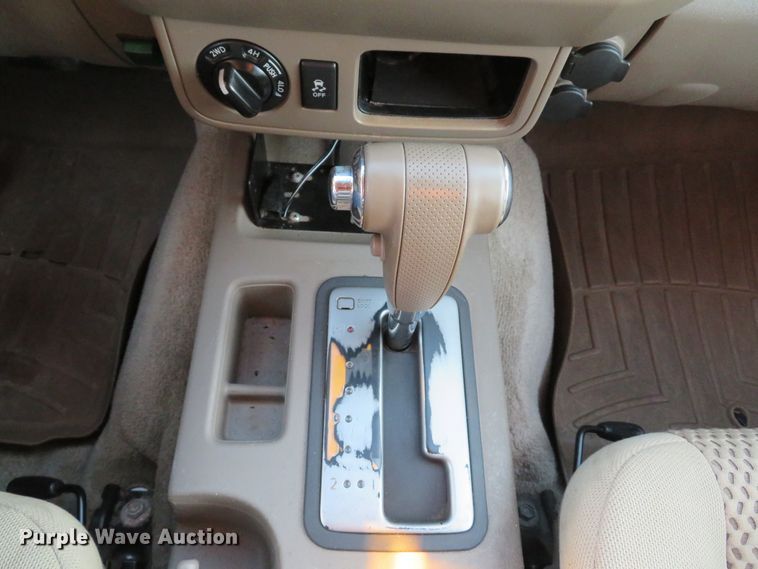 image for item DH1678 2014 Nissan Frontier Ext. Cab flatbed pickup truck