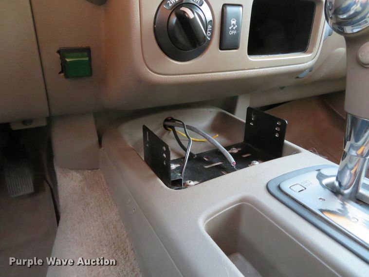 image for item DH1678 2014 Nissan Frontier Ext. Cab flatbed pickup truck