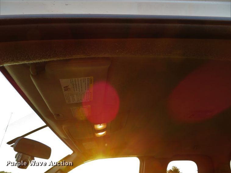 image for item DH1678 2014 Nissan Frontier Ext. Cab flatbed pickup truck