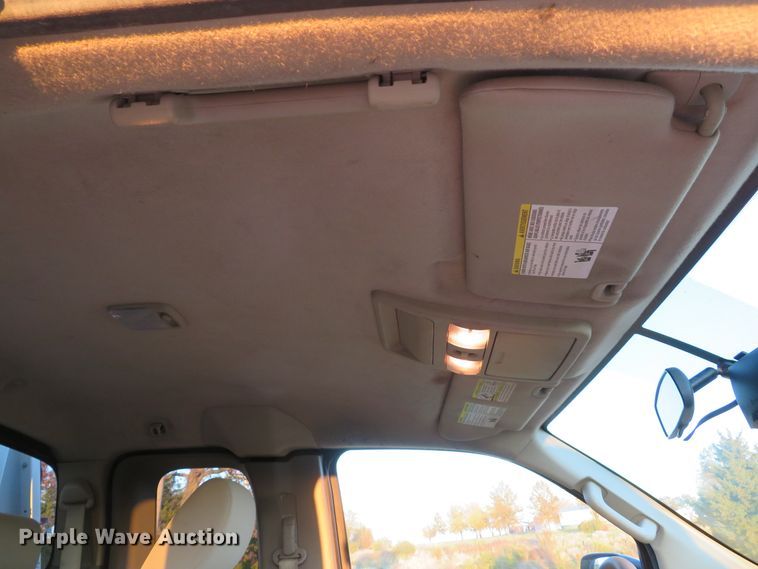 image for item DH1678 2014 Nissan Frontier Ext. Cab flatbed pickup truck