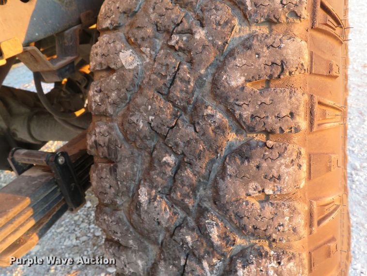 image for item DH1678 2014 Nissan Frontier Ext. Cab flatbed pickup truck