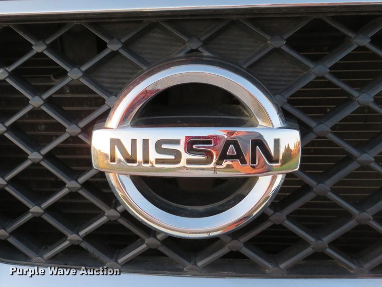 image for item DH1678 2014 Nissan Frontier Ext. Cab flatbed pickup truck