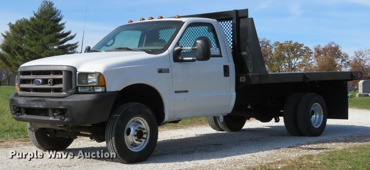 image for item DH1684 2000 Ford F350 Super Duty XL flatbed pickup truck