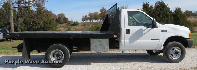 image for item DH1684 2000 Ford F350 Super Duty XL flatbed pickup truck