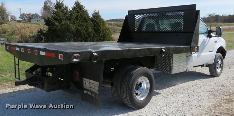 image for item DH1684 2000 Ford F350 Super Duty XL flatbed pickup truck