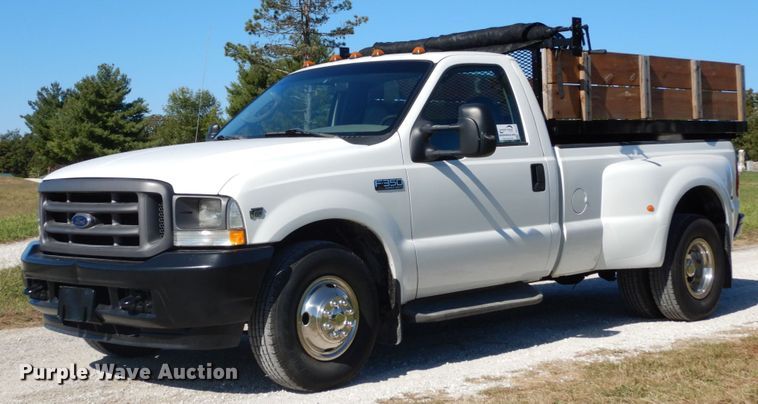 image for item DH2174 2004 Ford F350 Super Duty XL pickup truck with dump bed insert