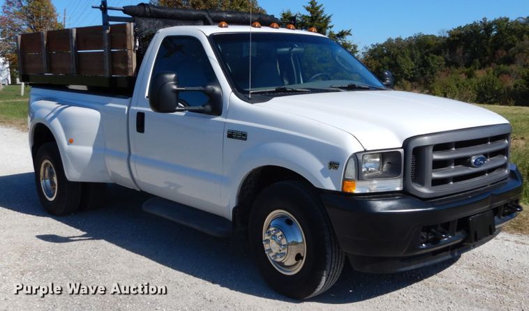 image for item DH2174 2004 Ford F350 Super Duty XL pickup truck with dump bed insert