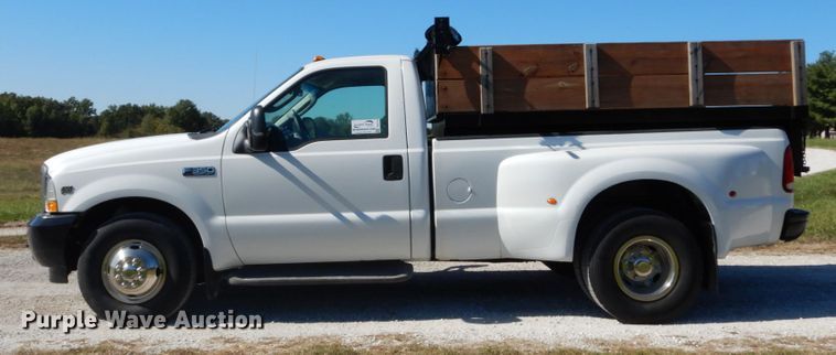 image for item DH2174 2004 Ford F350 Super Duty XL pickup truck with dump bed insert