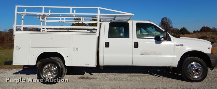 image for item DH2244 2005 Ford F350 Super Duty Crew Cab utility bed pickup truck