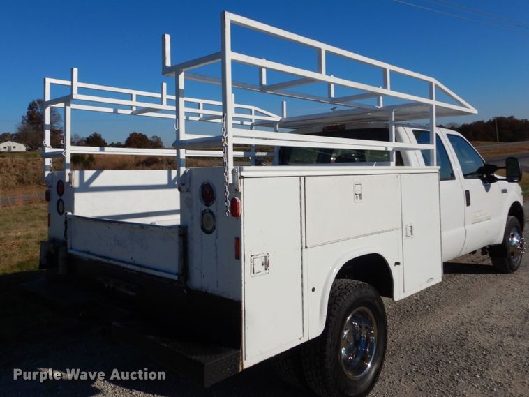 image for item DH2244 2005 Ford F350 Super Duty Crew Cab utility bed pickup truck