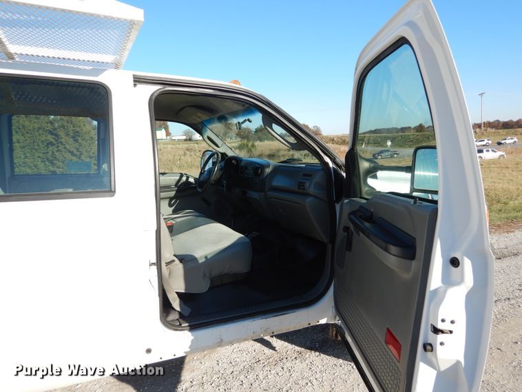 image for item DH2244 2005 Ford F350 Super Duty Crew Cab utility bed pickup truck