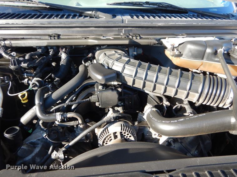 image for item DH2244 2005 Ford F350 Super Duty Crew Cab utility bed pickup truck