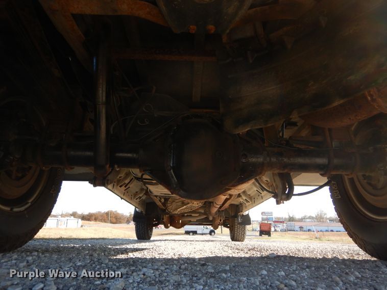 image for item DH2244 2005 Ford F350 Super Duty Crew Cab utility bed pickup truck