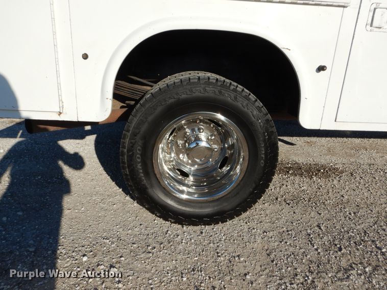 image for item DH2244 2005 Ford F350 Super Duty Crew Cab utility bed pickup truck