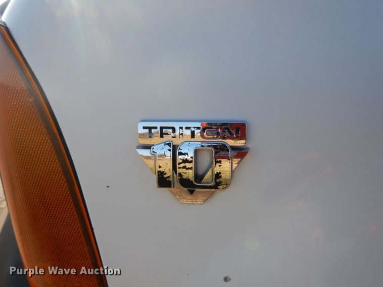 image for item DH2244 2005 Ford F350 Super Duty Crew Cab utility bed pickup truck