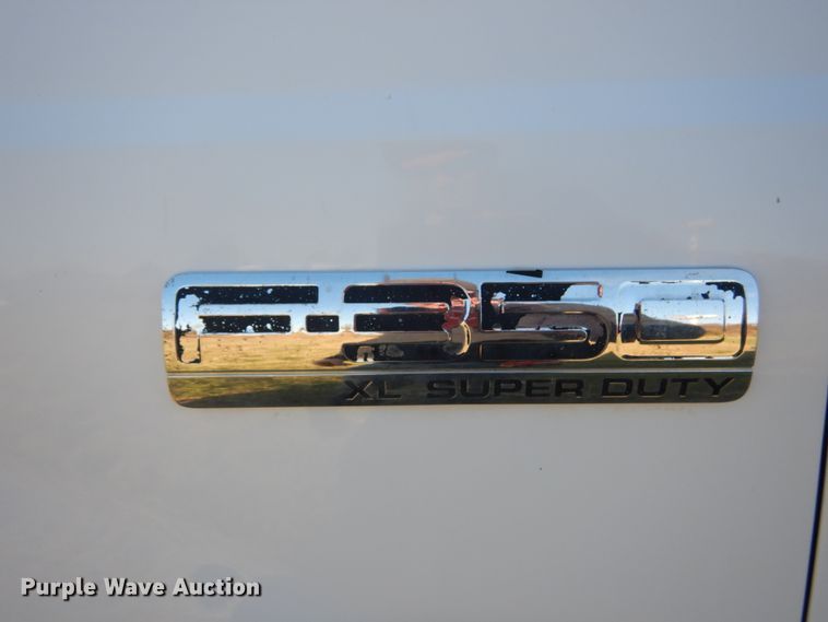 image for item DH2244 2005 Ford F350 Super Duty Crew Cab utility bed pickup truck