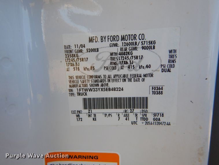 image for item DH2244 2005 Ford F350 Super Duty Crew Cab utility bed pickup truck