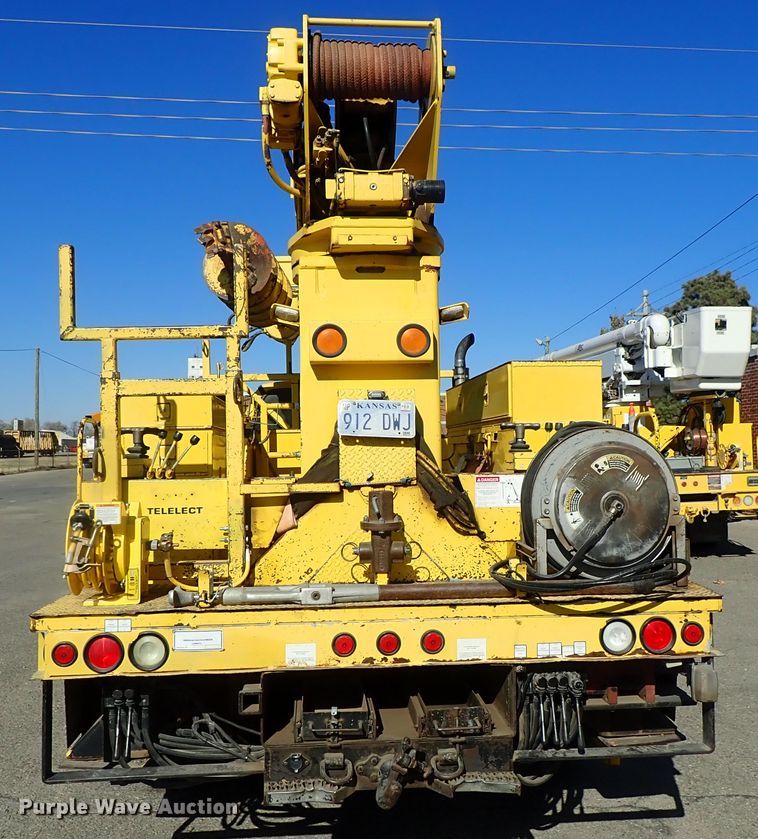 image for item DB7545 2004 Ford F750 Super Duty digger derrick truck