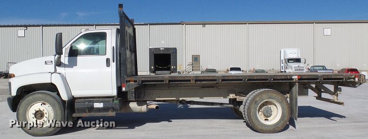 image for item DG5522 2005 GMC C7500 rollback truck