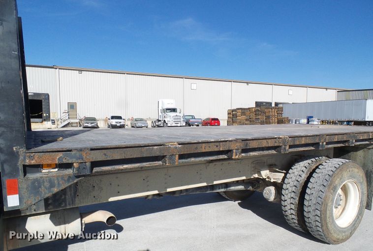 image for item DG5522 2005 GMC C7500 rollback truck