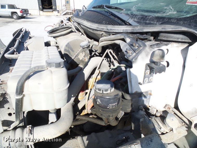 image for item DG5522 2005 GMC C7500 rollback truck