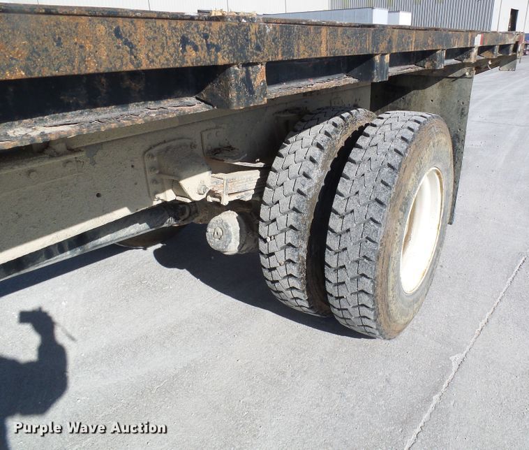 image for item DG5522 2005 GMC C7500 rollback truck