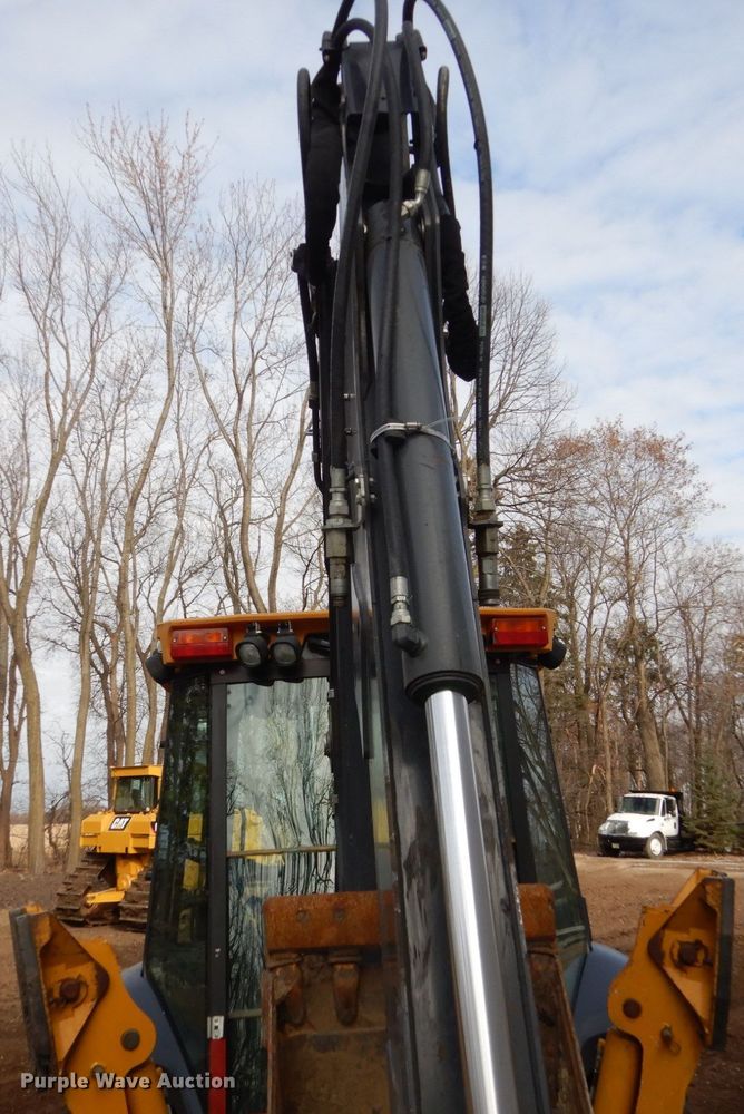 image for item EC9173 2015 John Deere 410L backhoe