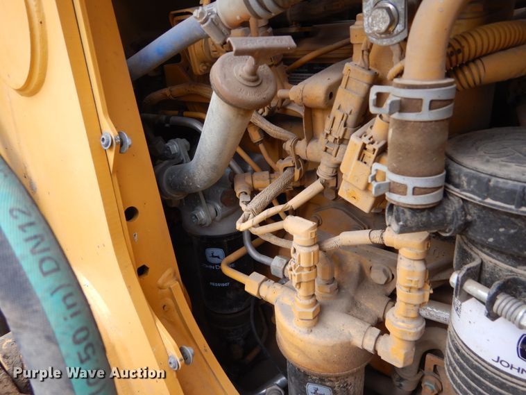 image for item EC9173 2015 John Deere 410L backhoe