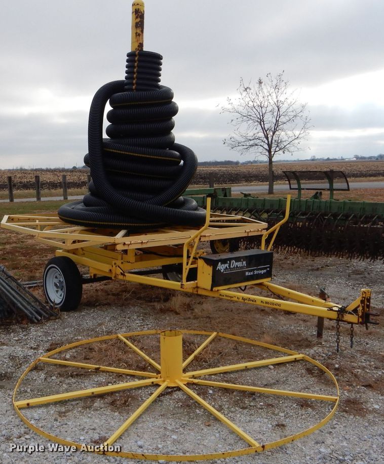 image for item FI9747 2003 Agri Drain Maxi Stringer reel trailer