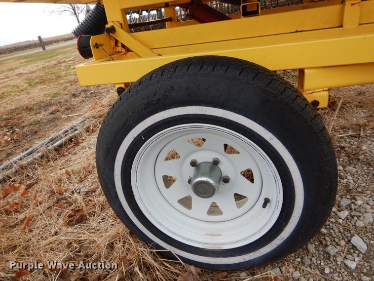 image for item FI9747 2003 Agri Drain Maxi Stringer reel trailer