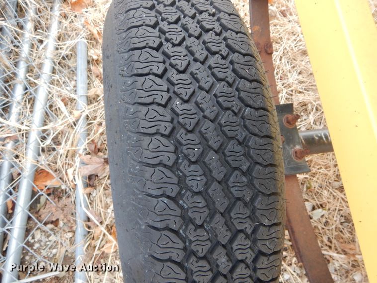 image for item FI9747 2003 Agri Drain Maxi Stringer reel trailer