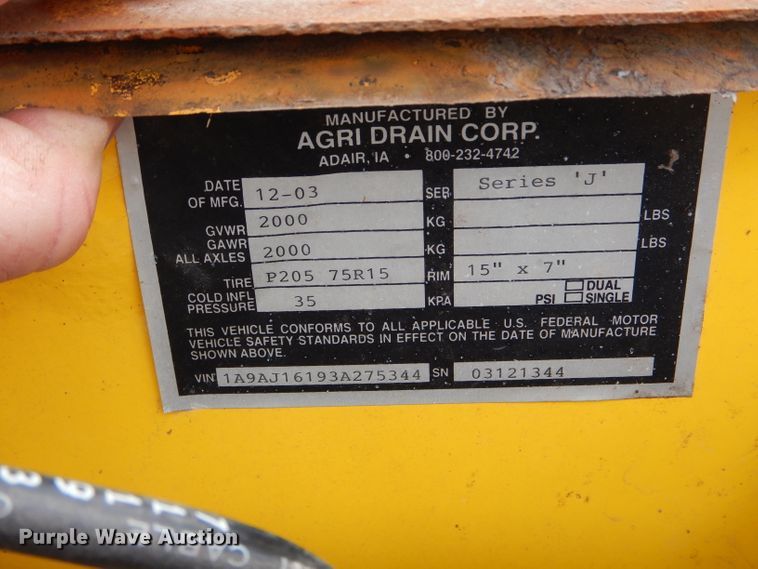 image for item FI9747 2003 Agri Drain Maxi Stringer reel trailer