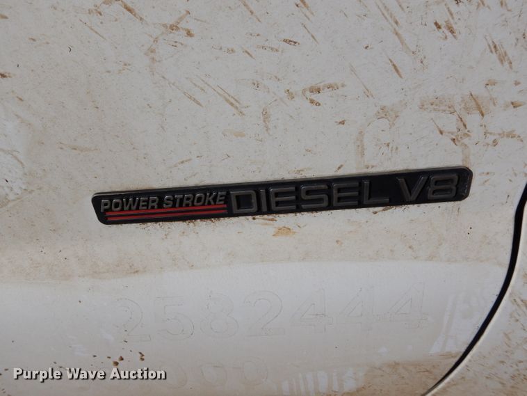 image for item GF9780 1999 Ford F450 Super Duty flatbed truck