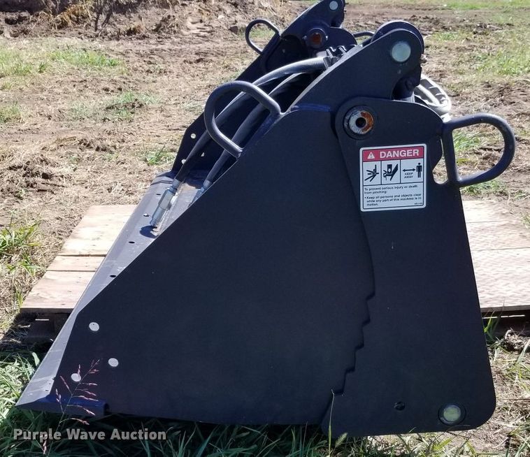 image for item H1193 Bradco 87722557 four-in-one combination skid steer bucket