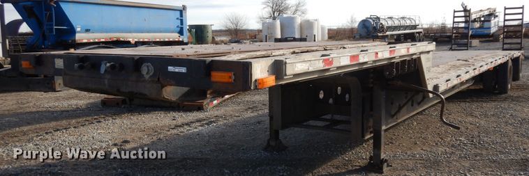 image for item GJ9159 1999 Transcraft drop deck equipment trailer