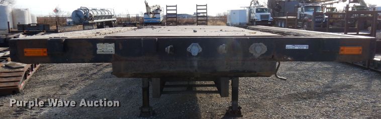 image for item GJ9159 1999 Transcraft drop deck equipment trailer